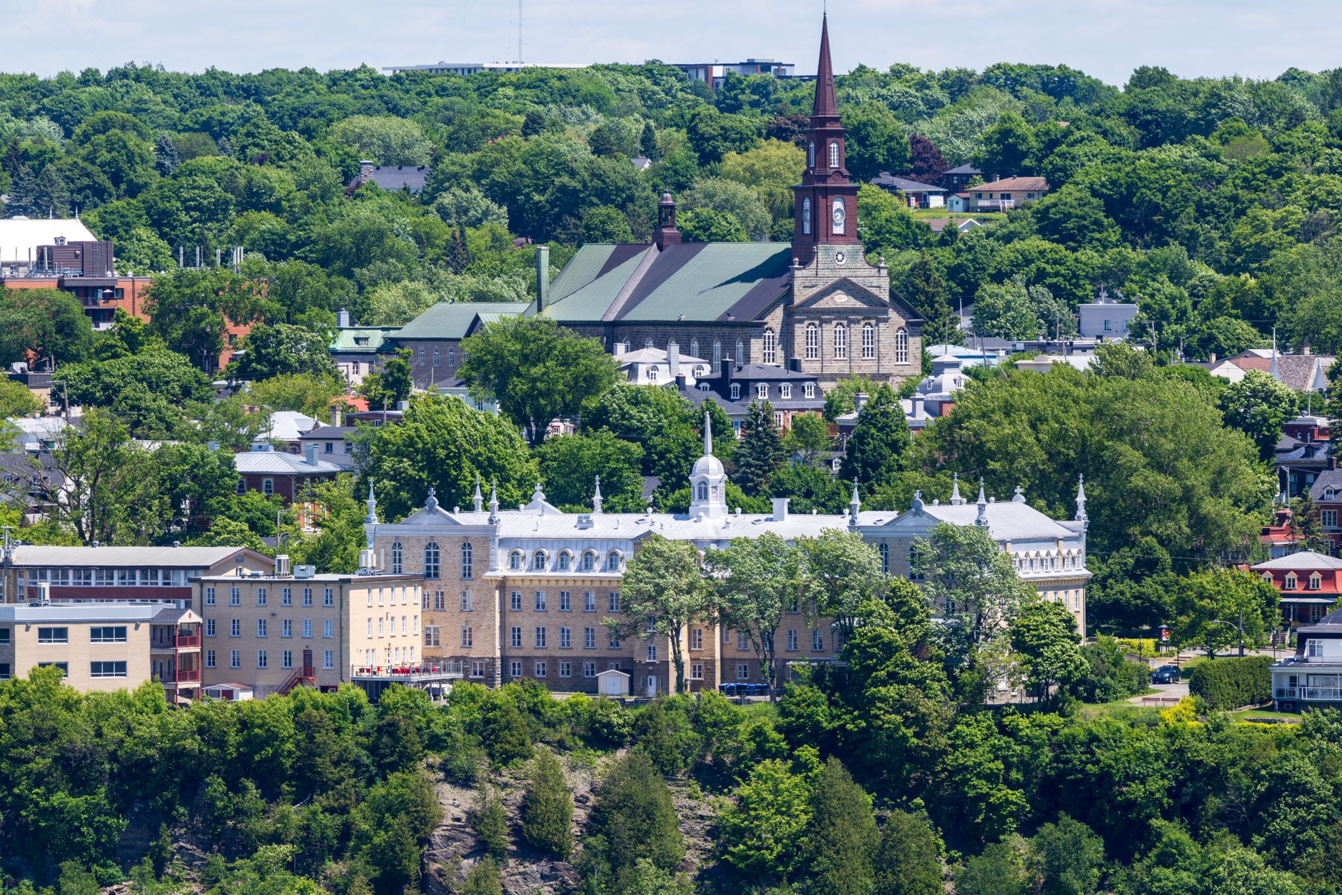 The Rivière des Prairies and green suburbs around Laval, near Tennis 13 Fitness