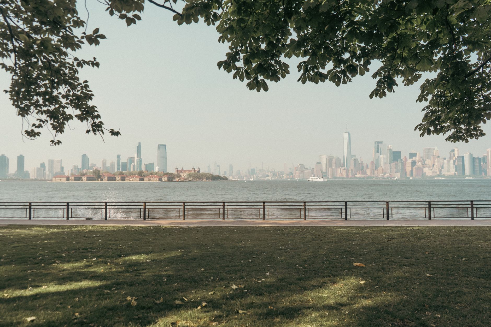 Jersey City parkland with the Manhattan skyline beyond, the setting of the free public tennis courts at Lincoln Park