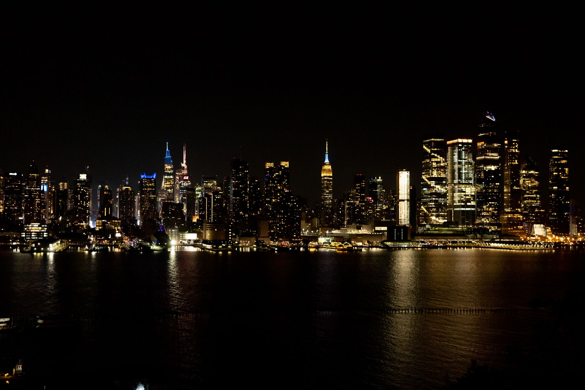 The Manhattan skyline at night seen from Long Island City, near CityView Racquet Club