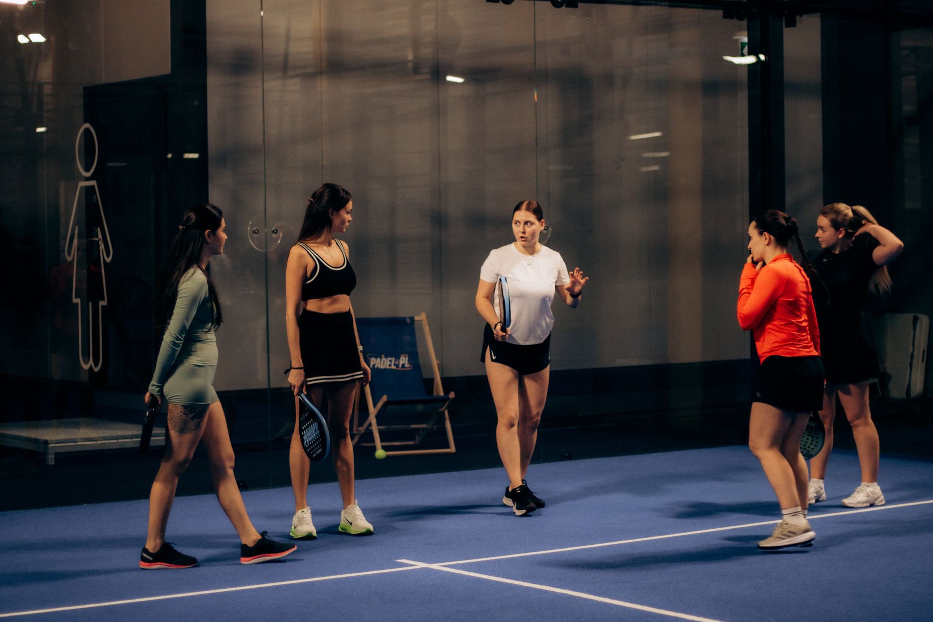 Tennis courts lit for evening play, representative of the Vaughan setting where Valan Tennis Academy trains its players