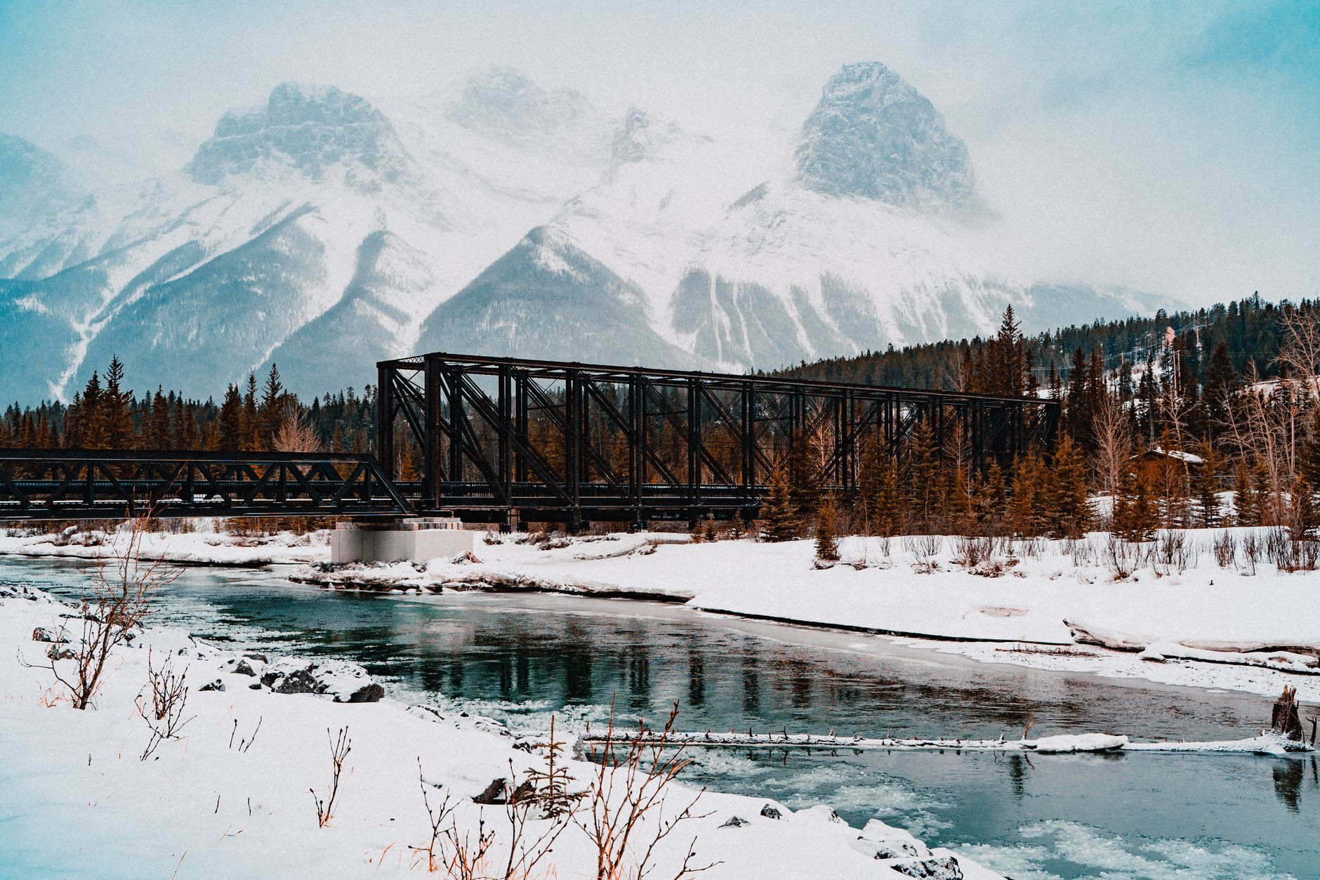 The Canadian Rockies rising above the mountain town of Canmore, Alberta