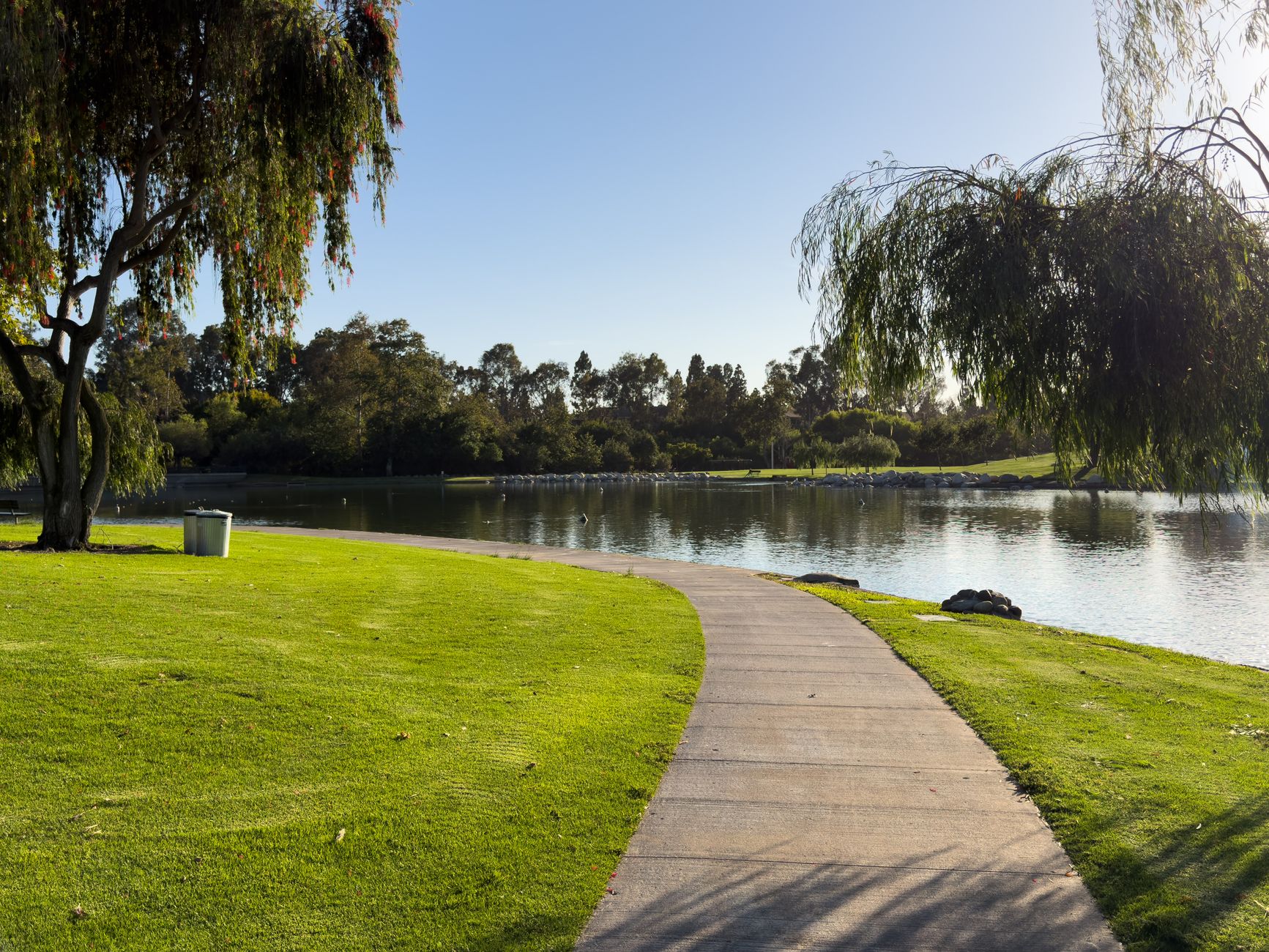 Wide green parkland in Irvine, the kind of setting the Great Park tennis courts sit in