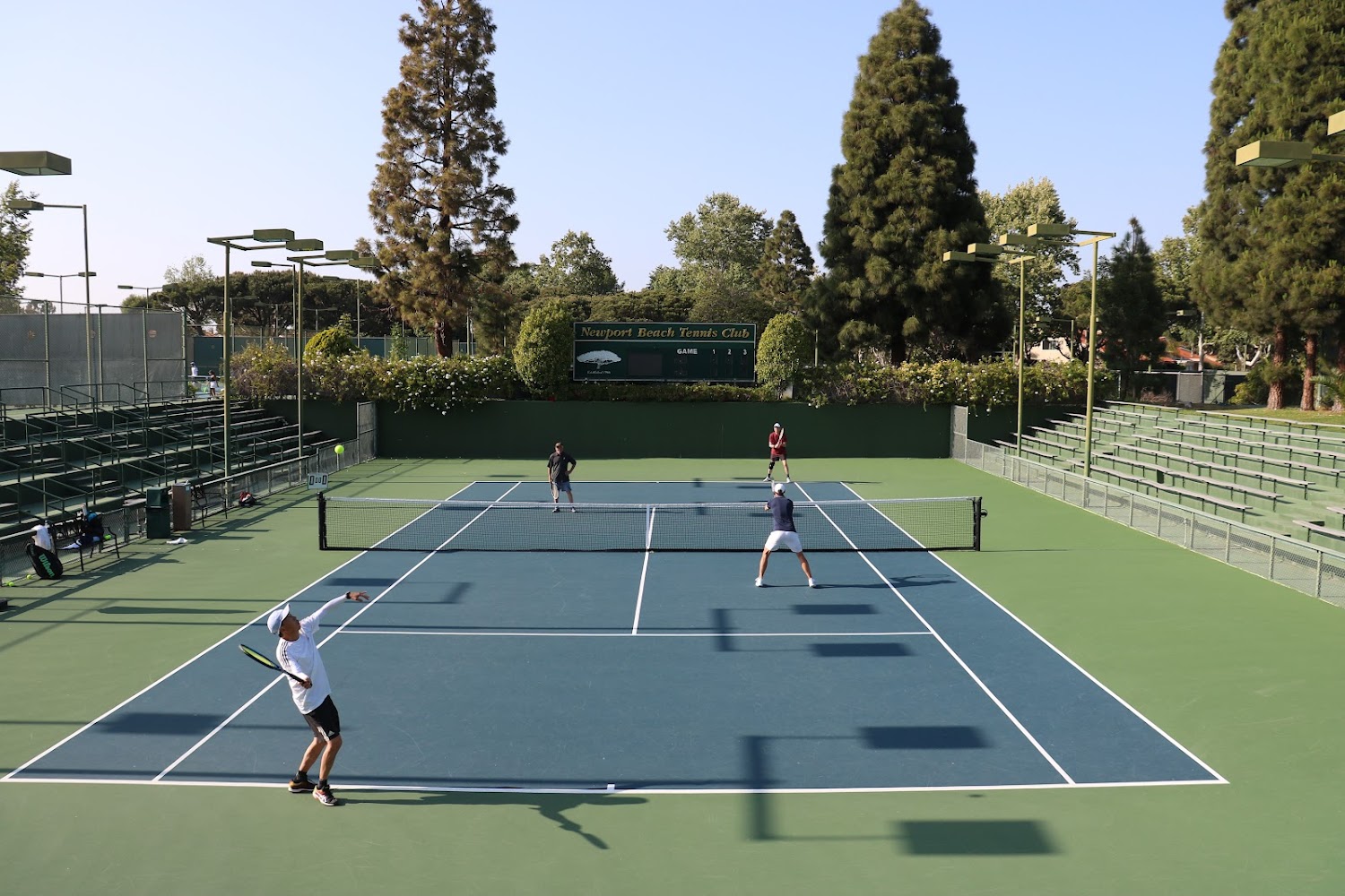 Outdoor hard courts at Newport Beach Tennis Club near the harbor