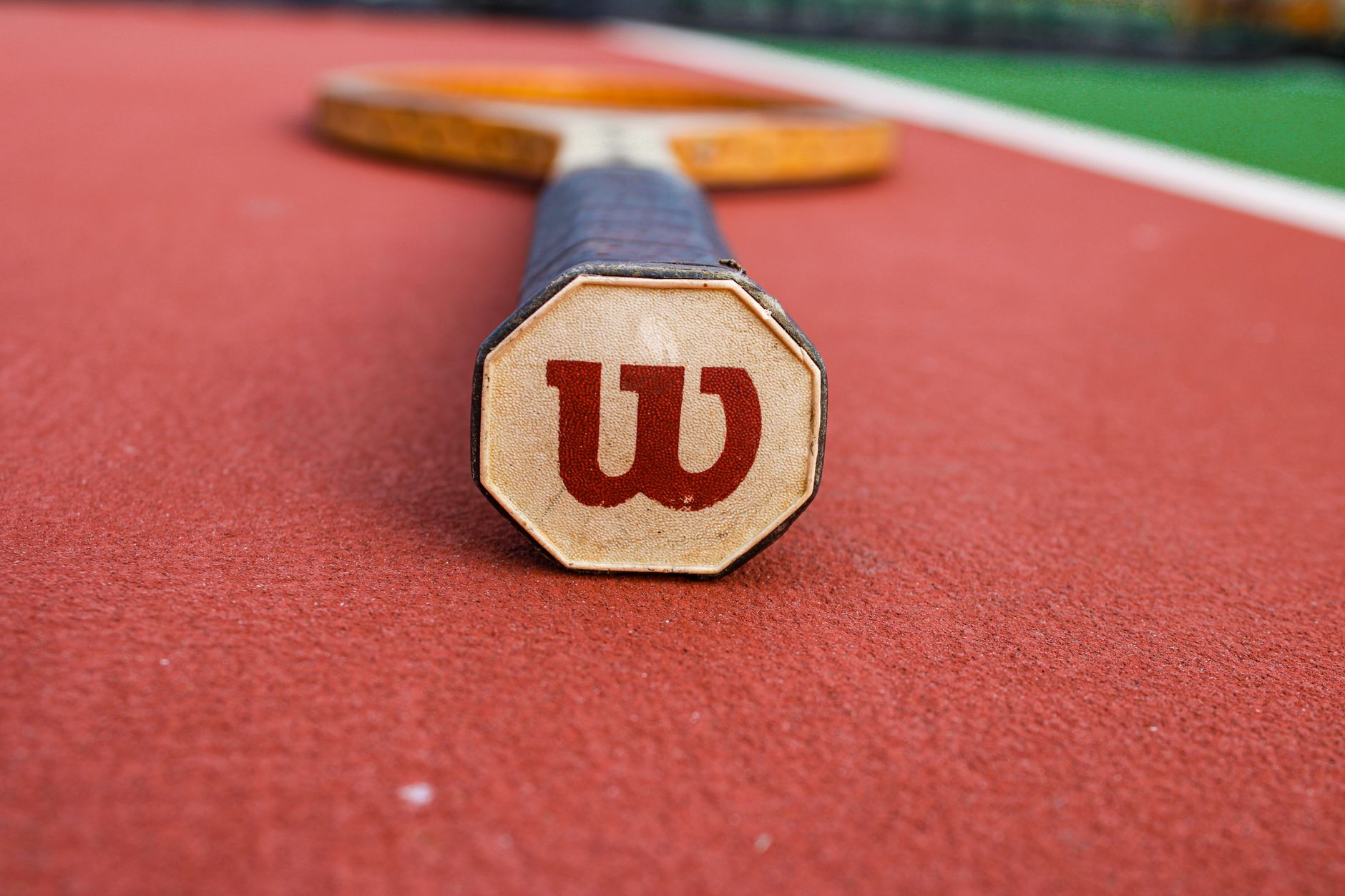 A tennis racquet close-up, representing B&T Racket in Fullerton