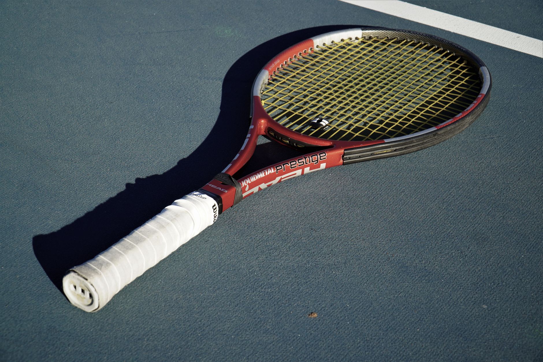 Tennis strings up close, evoking Racquets Rackets in Arcadia
