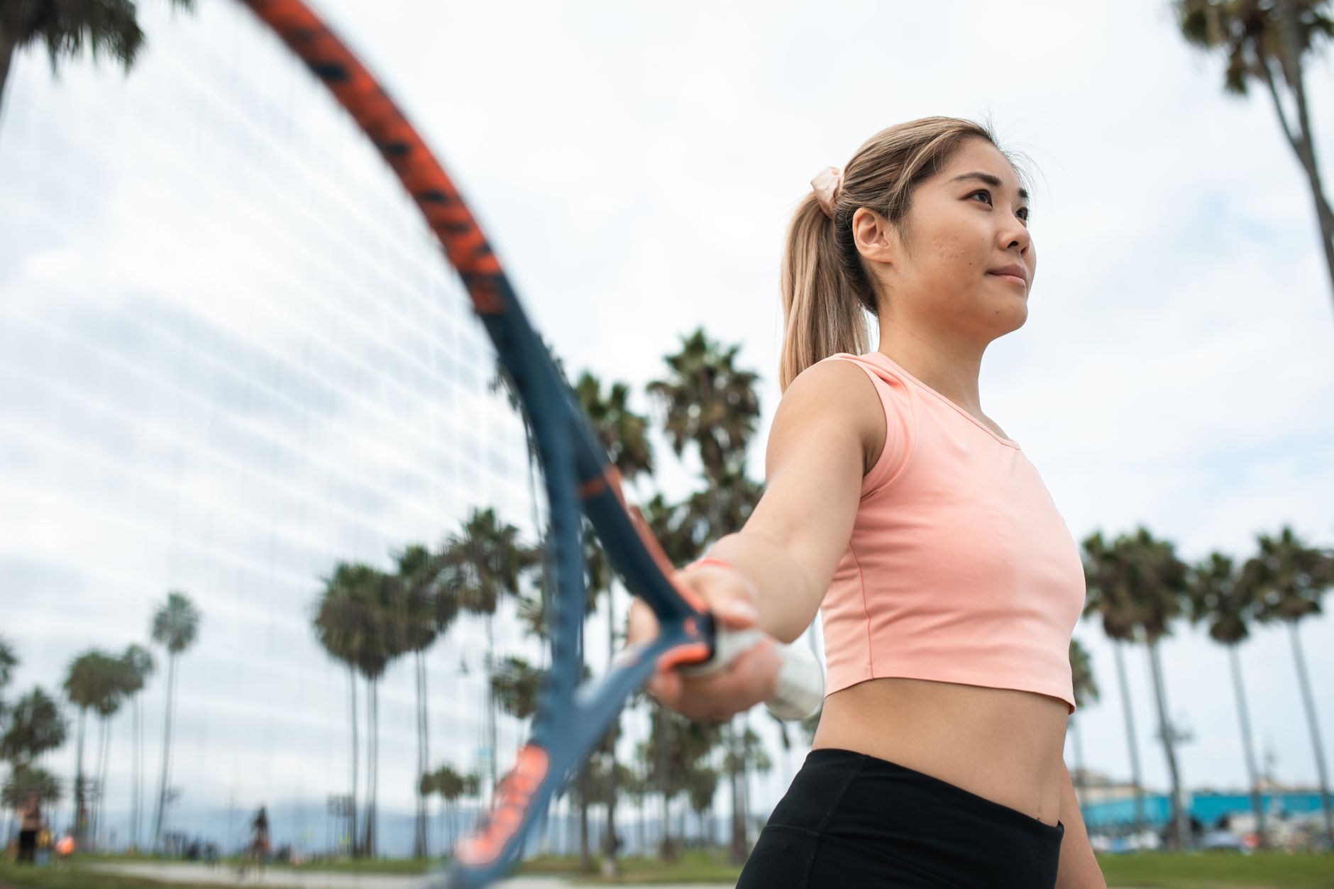 An old-school tennis gear scene, evoking Westwood Sporting Goods on the LA Westside