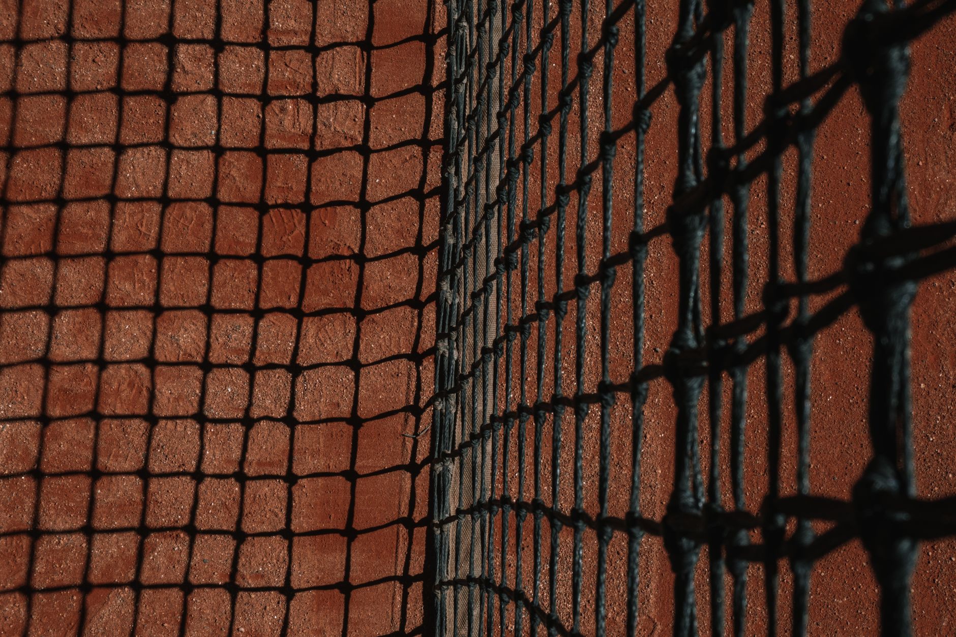 A tennis racquet and strings, evoking Z Racquet Shop in Artesia