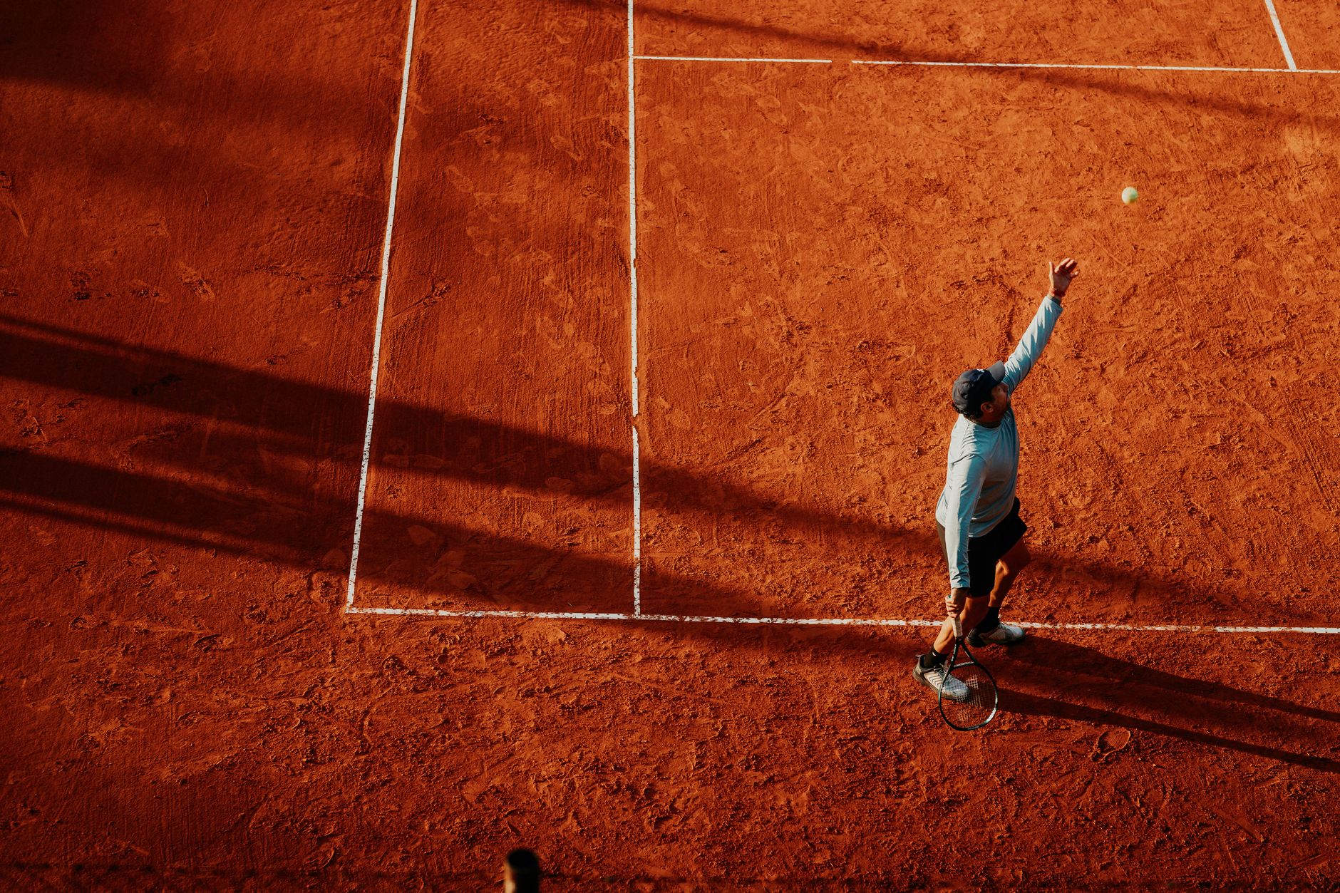 Green Har-Tru clay tennis courts, the surface underfoot at the member-run Dorval Tennis Club in Dorval, Quebec